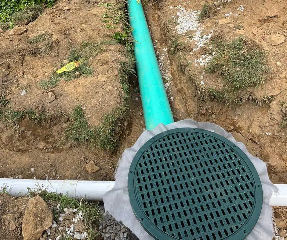 Green and white drainage pipes French Drain Installation Philadelphia, PA