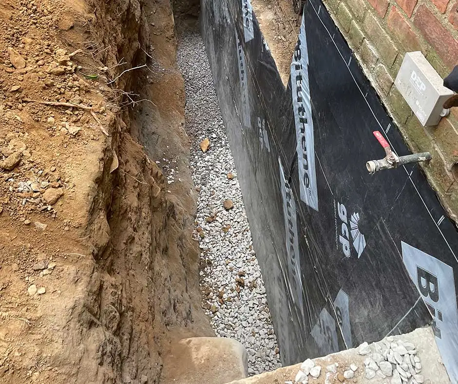Trench excavation for basement waterproofing Philadelphia, PA